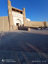 Low angle view of building against blue sky