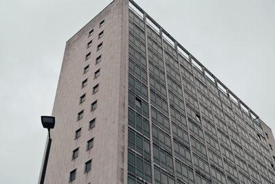 Low angle view of modern building against clear sky