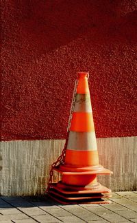 High angle view of traffic cone on footpath