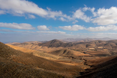 Scenic view of desert against sky