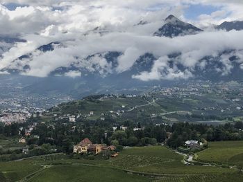 Scenic view of landscape and mountains against sky