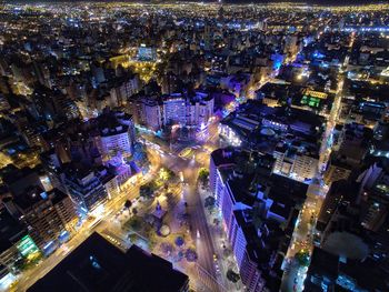 High angle view of illuminated cityscape at night