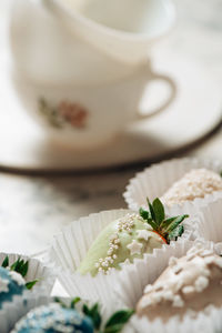 Close-up of coffee cup on table