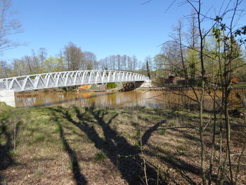 Bridge over river against sky