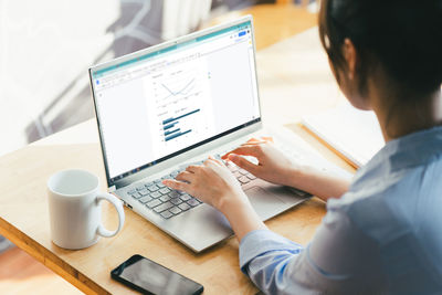 Man using laptop at office