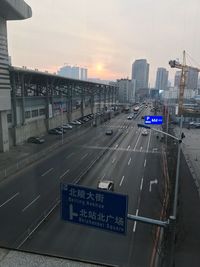 Road in city against sky