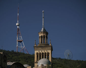 Low angle view of a building against blue sky