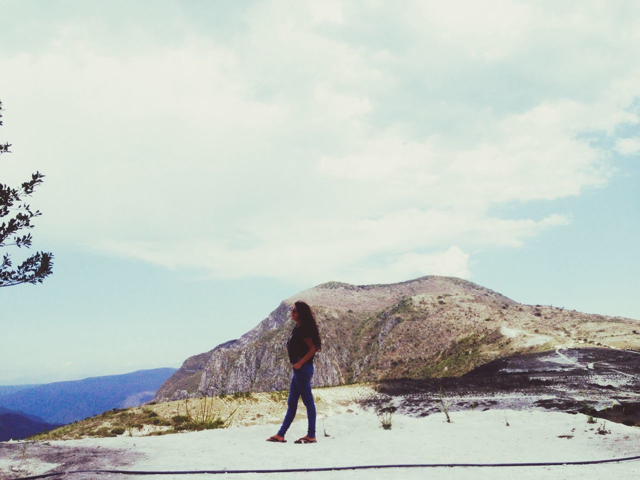 mountain, full length, rear view, leisure activity, lifestyles, sky, tranquil scene, standing, tranquility, scenics, landscape, beauty in nature, nature, casual clothing, mountain range, men, cloud - sky, walking