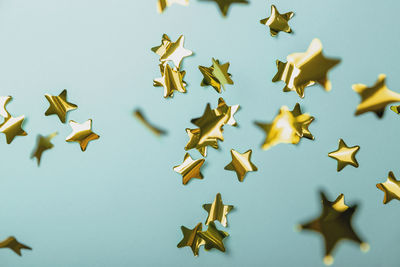Close-up of leaves against blue sky