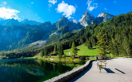 Panoramic shot of countryside lake against mountain range