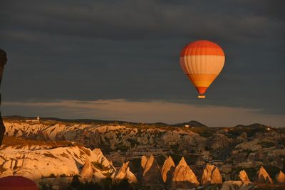 Parachute over rocky landscape