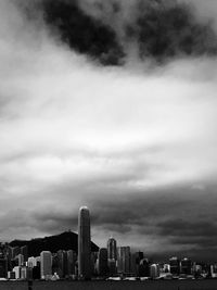 High section of cityscape against cloudy sky