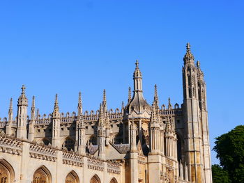 Low angle view of cathedral against clear blue sky