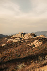 Mountainous landscape with rock and sky