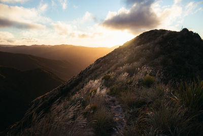 Scenic view of mountains against sky during sunset