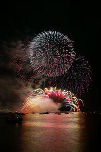 Firework display at night