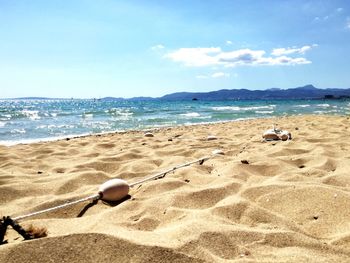 Scenic view of beach against sky