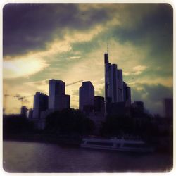 View of buildings against cloudy sky