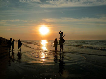 Scenic view of sea at sunset