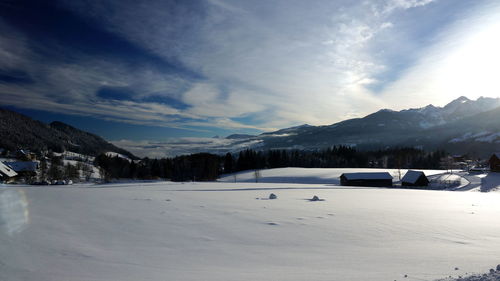 Scenic view of mountains against sky during winter