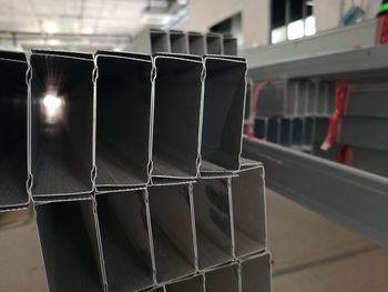 Close-up of metal railing on table in building