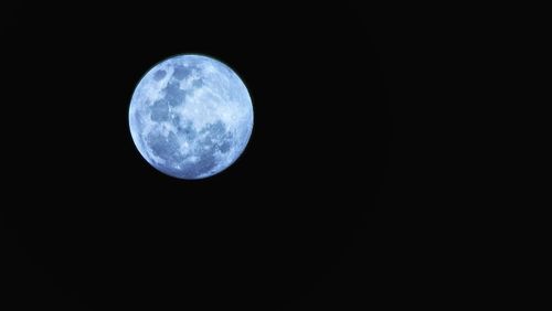 Low angle view of moon in sky