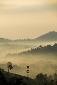 Scenic view of mountains against sky during sunset