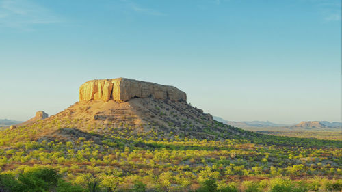 Scenic view of land against sky