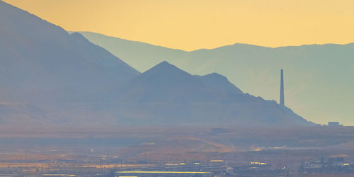 Scenic view of mountains against sky during sunset