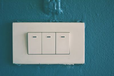 Close-up of mailbox on wall