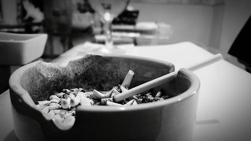 Close-up of cigarette on table