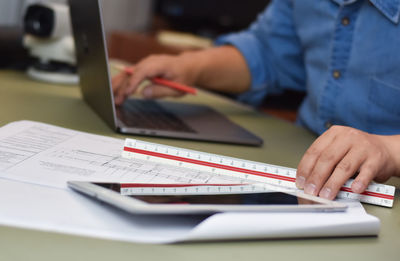 Man using laptop on table