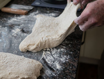 Midsection of person preparing food