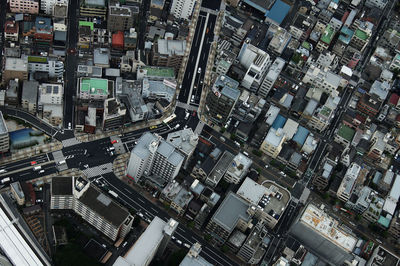 High angle view of street amidst buildings in city