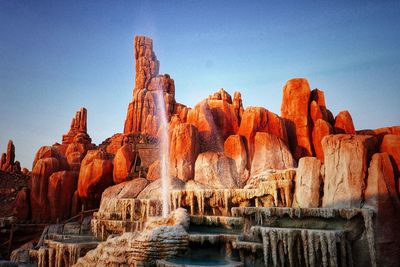 Panoramic view of rock formations against sky