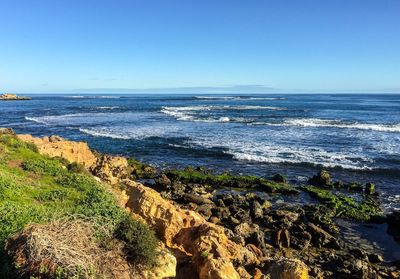 Scenic view of sea against clear sky