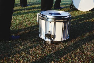 High angle view of garbage bin on field