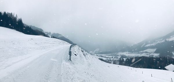 Snow covered mountain against sky