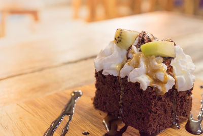 Chocolate brownie cake and whipped cream