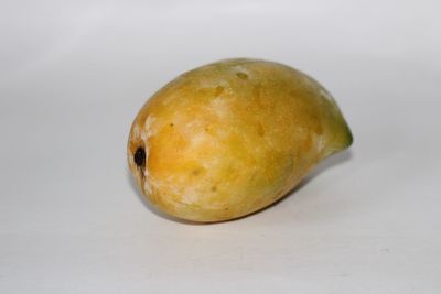 Close-up of apple against white background