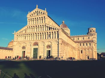 Facade of historic building against blue sky