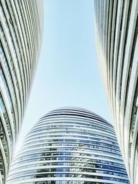 Low angle view of skyscraper against clear sky
