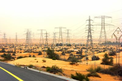 Electricity pylons on road