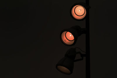 Low angle view of illuminated lights