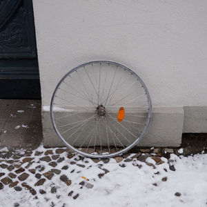 Close-up of circular object on wall