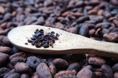 Close-up of wooden spoon with food