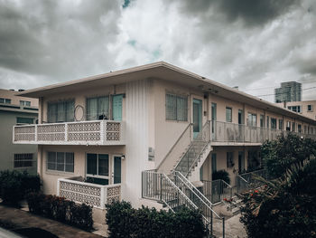 View of residential building against cloudy sky