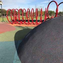 Red umbrella against sky