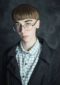 Portrait of young man wearing eyeglasses