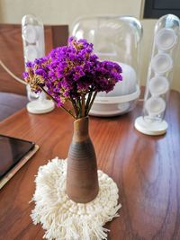 Close-up of flower vase on table